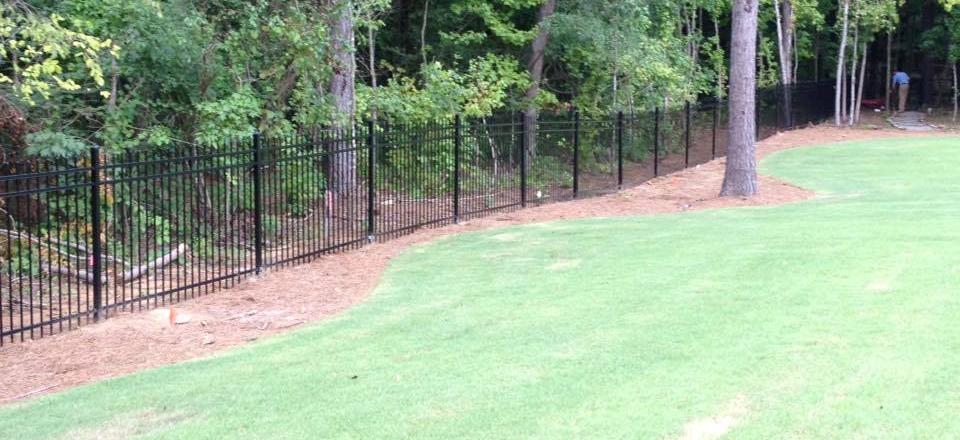 From chain-link fencing to wood fencing, we can install them all! Just like this beautiful iron wrought fencing illustrated in the photo above! 